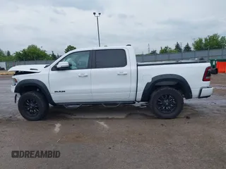 2020 Ram 1500 Big Horn with VIN 1C6SRFFT0LN105011, listed as a IAAI auction lot 42512812 with 71,825 mi miles and . Bid and sale history available at DreamBid. Image 14.