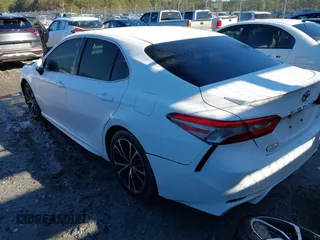 2018 Toyota Camry LE with VIN 4T1B11HK3JU658046, listed as a IAAI auction lot 41222583 with 325,249 mi miles. Bid and sale history available at carsss.com. Image 3.