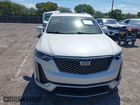 2020 Cadillac XT6 FWD Premium Luxury z VIN 1GYKPCRS1LZ228982, wystawiony jako IAAI lot #41975364 z przebiegiem 84 803 mil mil oraz . Historia ofert i sprzedaży dostępna na DreamBid. Obrazek 6.