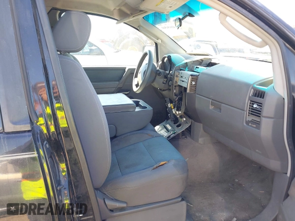 2005 Nissan Titan XE with VIN 1N6BA06A15N560400, listed as a IAAI auction lot 41656560 with 212,568 mi miles. Bid and sale history available at carsss.com. Image 5.