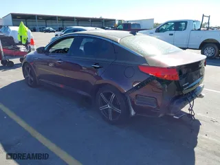 2015 Kia Optima EX with VIN 5XXGN4A75FG391608, listed as a IAAI auction lot 41817373 with 143,031 mi miles. Bid and sale history available at carsss.com. Image 3.