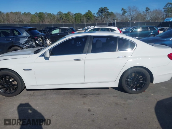 2013 BMW 5 Series 528i with VIN WBAXG5C53DD232909, listed as a IAAI auction lot 41620696 with 181,375 mi miles and . Bid and sale history available at carsss.com. Image 14.