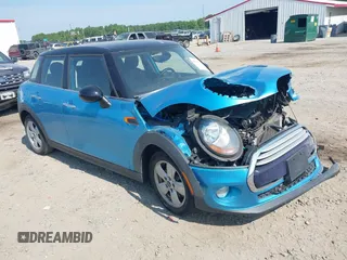 2015 MINI Hardtop 4 Door with VIN WMWXS5C56FT831505, listed as a IAAI auction lot 42155398 with 95,693 mi miles and . Bid and sale history available at DreamBid. Image 1.