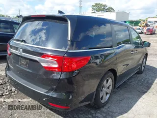 2018 Honda Odyssey EX-L with VIN 5FNRL6H75JB065206, listed as a IAAI auction lot 42009227 with 133,652 mi miles. Bid and sale history available at carsss.com. Image 4.