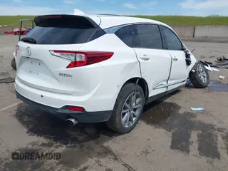 2020 Acura RDX Technology with VIN 5J8TC1H56LL008117, listed as a IAAI auction lot 42013206 with 83,032 mi miles and . Bid and sale history available at DreamBid. Image 4.
