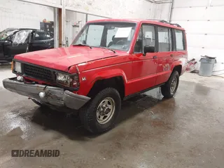 1991 Isuzu Trooper z VIN JACCH58R6M8905869, wystawiony jako IAAI lot #42394651 z przebiegiem 117 130 mil mil oraz . Historia ofert i sprzedaży dostępna na DreamBid. Obrazek 2.