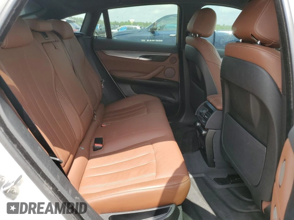 2018 BMW X6 sDrive35i with VIN 5UXKU0C52J0G80569, listed as a Copart auction lot 49991705 with 77,531 mi miles and Salvage Title. Bid and sale history available at carsss.com. Image 11.