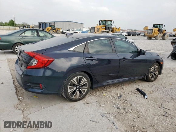 2016 Honda Civic EX-T z VIN 19XFC1F37GE012186, wystawiony jako Copart lot #51590575 z przebiegiem 121 041 mil mil oraz Szkoda całkowita • Salvage title. Historia ofert i sprzedaży dostępna na DreamBid. Obrazek 3.