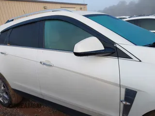 2011 Cadillac SRX Performance Collection with VIN 3GYFNBEY4BS600709, listed as a IAAI auction lot 40858453 with 148,769 mi miles. Bid and sale history available at carsss.com. Image 13.