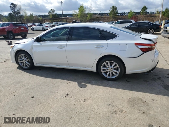 2015 Toyota Avalon Limited with VIN 4T1BK1EB4FU169051, listed as a Copart auction lot 51430025 with 125,679 mi miles and Salvage Title. Bid and sale history available at DreamBid. Image 2.