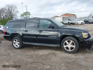 2013 Chevrolet Suburban LT with VIN 1GNSKJE70DR284785, listed as a IAAI auction lot 41838484 with 113,696 mi miles. Bid and sale history available at carsss.com. Image 13.