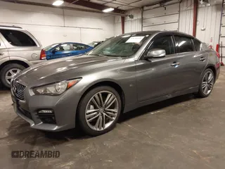 2014 Infiniti Q50 Premium with VIN JN1BV7ARXEM699902, listed as a IAAI auction lot 42135410 with 103,929 mi miles and . Bid and sale history available at DreamBid. Image 2.
