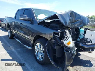 2020 Ram 1500 Lone Star with VIN 1C6RREFT9LN262285, listed as a IAAI auction lot 42010474 with 80,965 mi miles and . Bid and sale history available at DreamBid. Image 1.