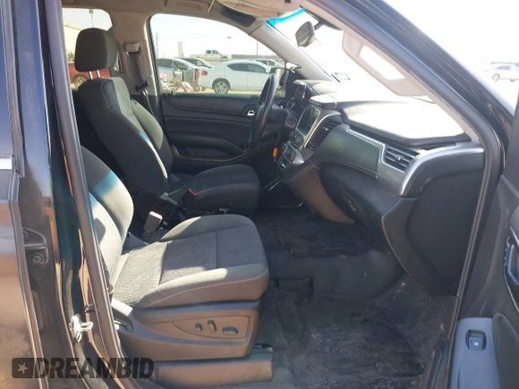 2015 Chevrolet Tahoe Commercial z VIN 1GNLC2EC7FR575386, wystawiony jako IAAI lot #41836137 z przebiegiem 143 231 mil mil oraz . Historia ofert i sprzedaży dostępna na DreamBid. Obrazek 5.