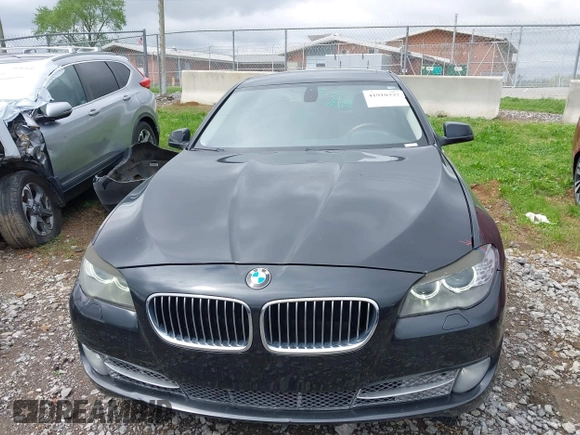 2012 BMW 5 Series 528i with VIN WBAXG5C5XCDX01864, listed as a IAAI auction lot 41910337 with 200,110 mi miles. Bid and sale history available at carsss.com. Image 13.