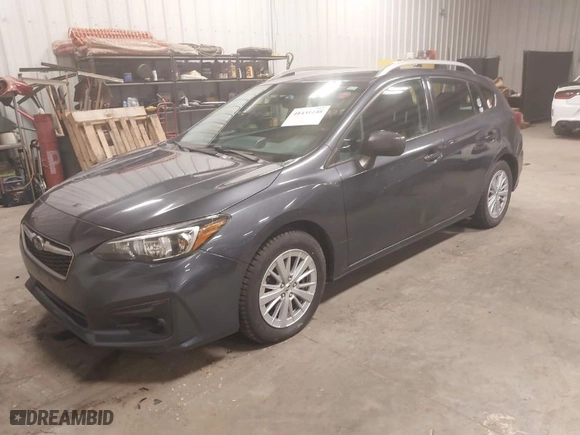 2017 Subaru Impreza Premium with VIN 4S3GTAB69H3739066, listed as a IAAI auction lot 41431248 with 123996 miles. Bid and sale history available at carsss.com. Image 2.