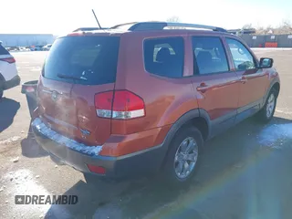 2009 Kia Borrego LX with VIN KNDJH741295034028, listed as a IAAI auction lot 41371961 with 99,785 mi miles. Bid and sale history available at carsss.com. Image 4.
