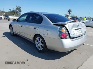 2002 Nissan Altima SE with VIN 1N4BL11E72C169164, listed as a IAAI auction lot 41992002 with 100,211 mi miles. Bid and sale history available at carsss.com. Image 3.