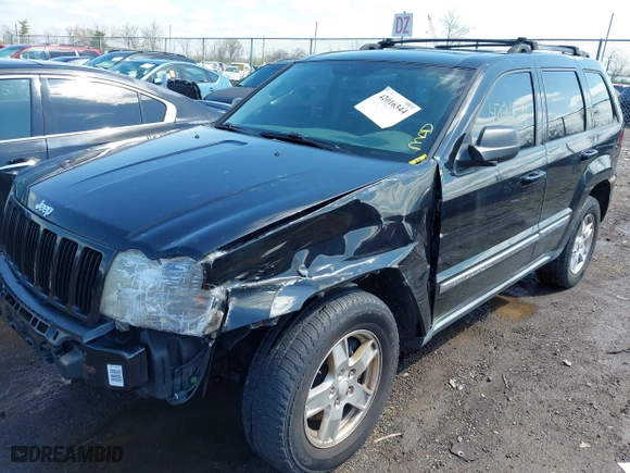 2007 Jeep Grand Cherokee Laredo with VIN 1J8GR48K57C519919, listed as a IAAI auction lot 42016344 with 190,132 mi miles. Bid and sale history available at carsss.com. Image 2.