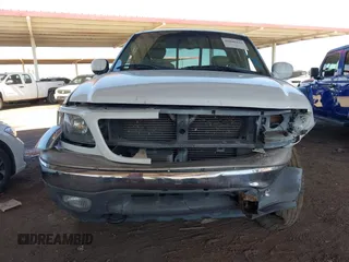 2003 Ford F-150 XL with VIN 1FTRX18L03NA45728, listed as a IAAI auction lot 41860421 with 179,596 mi miles. Bid and sale history available at carsss.com. Image 12.