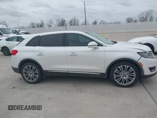 2016 Lincoln MKX Reserve with VIN 2LMPJ6LP8GBL33580, listed as a IAAI auction lot 41749632 with 100,579 mi miles. Bid and sale history available at carsss.com. Image 13.