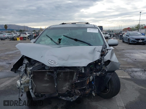 2012 Toyota Sienna XLE with VIN 5TDDK3DC9CS042847, listed as a IAAI auction lot 40970090 with 101,813 mi miles. Bid and sale history available at carsss.com. Image 13.
