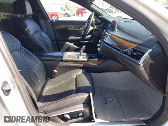 2016 BMW 7 Series 750i xDrive with VIN WBA7F2C52GG417733, listed as a IAAI auction lot 42040625 with 91,007 mi miles. Bid and sale history available at carsss.com. Image 5.