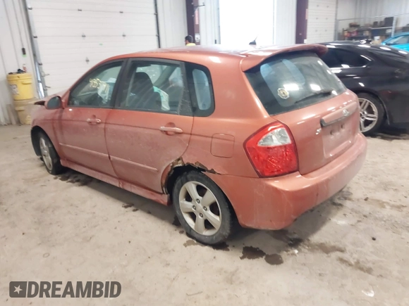 2007 Kia Spectra with VIN KNAFE162575000628, listed as a IAAI auction lot 41353741 with 152,693 mi miles. Bid and sale history available at carsss.com. Image 3.