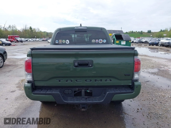 2021 Toyota Tacoma SR with VIN 3TMCZ5AN5MM380286, listed as a IAAI auction lot 42165523 with 58,965 mi miles and . Bid and sale history available at DreamBid. Image 16.