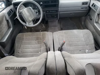 1992 Plymouth Acclaim z VIN 1P3XA4631NF248220, wystawiony jako Copart lot #84113754 z przebiegiem 117 489 mil mil oraz Szkody całkowita. Historia ofert i sprzedaży dostępna na DreamBid. Obrazek 8.