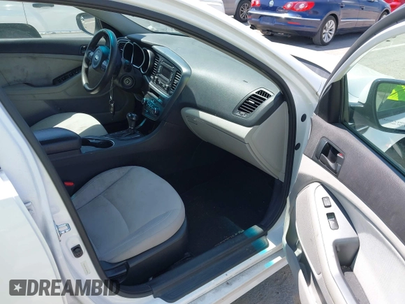 2015 Kia Optima LX with VIN 5XXGM4A76FG443962, listed as a IAAI auction lot 42069701 with 101,516 mi miles. Bid and sale history available at carsss.com. Image 5.