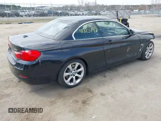 2015 BMW 4 Series 435i with VIN WBA3T3C51FP939555, listed as a IAAI auction lot 41815749 with 57,480 mi miles and . Bid and sale history available at carsss.com. Image 4.