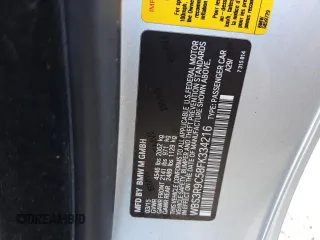 2015 BMW M4 with VIN WBS3R9C58FK334216, listed as a Copart auction lot 61497804 with 112,191 mi miles and Salvage Title. Bid and sale history available at carsss.com. Image 12.
