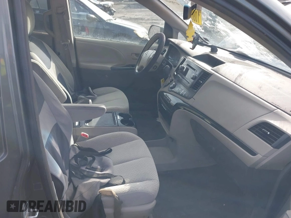 2013 Toyota Sienna LE AAS with VIN 5TDKK3DC9DS334815, listed as a IAAI auction lot 41589497 with 223,674 mi miles and . Bid and sale history available at DreamBid. Image 5.