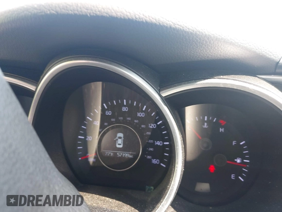 2015 Kia Optima LX with VIN 5XXGM4A75FG378795, listed as a IAAI auction lot 42604014 with 57,199 mi miles and . Bid and sale history available at DreamBid. Image 7.