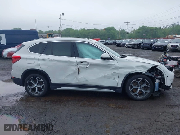 2018 BMW X1 xDrive28i with VIN WBXHT3C38J5L31322, listed as a IAAI auction lot 42260190 with 70,266 mi miles and . Bid and sale history available at DreamBid. Image 17.