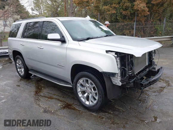 2015 GMC Yukon SLT with VIN 1GKS2BKC0FR676107, listed as a IAAI auction lot 41962929 with 132,389 mi miles. Bid and sale history available at carsss.com. Image 1.