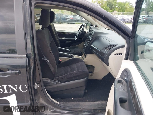 2014 Dodge Grand Caravan SXT z VIN 2C4RDGCGXER388459, wystawiony jako IAAI lot #42350937 z przebiegiem 149 276 mil mil oraz . Historia ofert i sprzedaży dostępna na DreamBid. Obrazek 5.