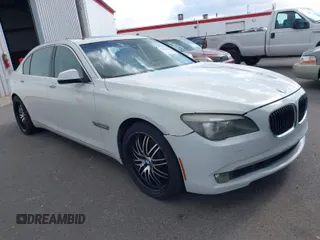 2012 BMW 7 Series 750Li with VIN WBAKB8C5XCC962542, listed as a IAAI auction lot 41945486 with 115,647 mi miles. Bid and sale history available at carsss.com. Image 1.