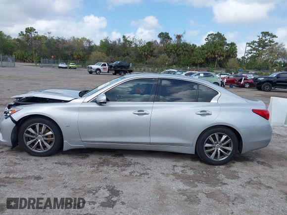 2014 Infiniti Q50 Premium z VIN JN1BV7AP9EM690381, wystawiony jako IAAI lot #41761562 z przebiegiem 107 099 mil mil oraz . Historia ofert i sprzedaży dostępna na DreamBid. Obrazek 14.