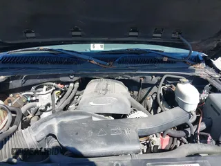 2005 Chevrolet Suburban LT with VIN 1GNFK16Z55J251296, listed as a IAAI auction lot 42119068 with 312,449 mi miles. Bid and sale history available at carsss.com. Image 10.