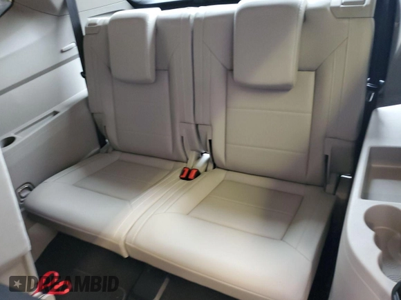 2023 Volkswagen Atlas SE z VIN 1V2HR2CA5PC527628, wystawiony jako IAAI lot #42569146 z przebiegiem 27 424 mil mil oraz . Historia ofert i sprzedaży dostępna na DreamBid. Obrazek 10.