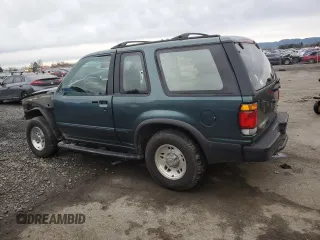 1997 Ford Explorer with VIN 1FMCU24E5VUB71602, listed as a Copart auction lot 87081674 with 193,534 mi miles and Salvage title. Bid and sale history available at DreamBid. Image 2.
