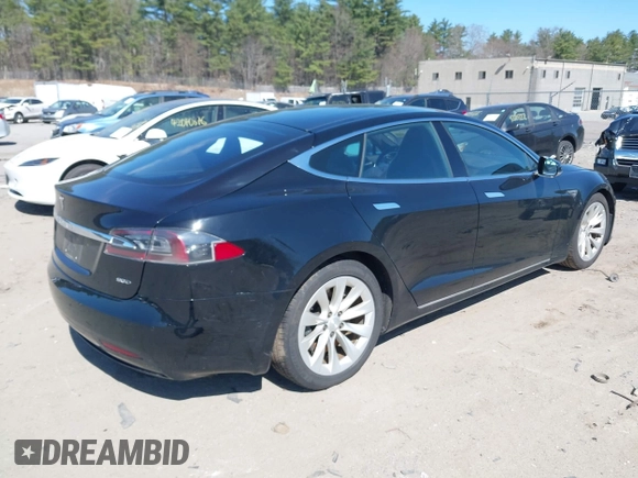 2016 Tesla Model S 90D with VIN 5YJSA1E21GF140740, listed as a IAAI auction lot 42062461 with 237,943 mi miles and . Bid and sale history available at DreamBid. Image 4.