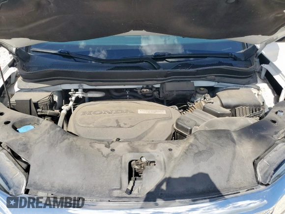 2020 Honda Pilot Touring 7-Passenger with VIN 5FNYF6H69LB018905, listed as a Copart auction lot 61209685 with 61,637 mi miles and Salvage title. Bid and sale history available at DreamBid. Image 12.