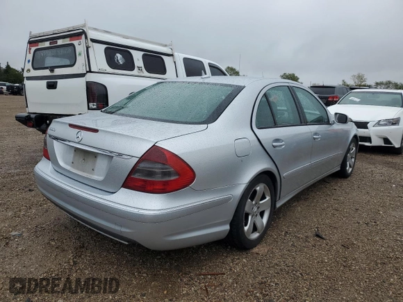 2007 Mercedes-Benz E 550 with VIN WDBUF72X77B059322, listed as a Copart auction lot 72271754 with 149,204 mi miles and Salvage Title. Bid and sale history available at DreamBid. Image 3.