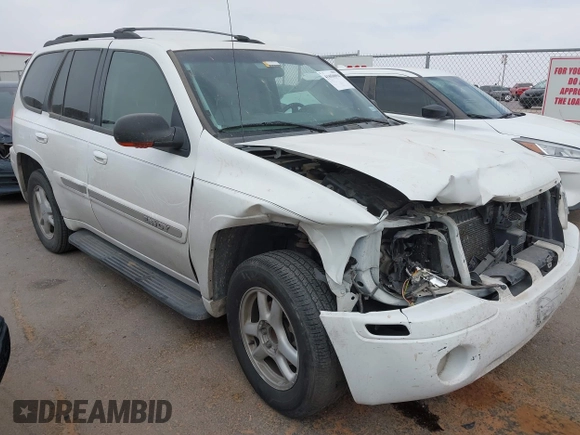 2003 GMC Envoy SLE with VIN 1GKDS13S532253648, listed as a IAAI auction lot 41850094 with 147,254 mi miles. Bid and sale history available at carsss.com. Image 1.