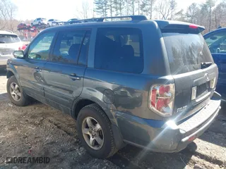2006 Honda Pilot EX-L with VIN 2HKYF18596H500645, listed as a IAAI auction lot 41749033 with 242,599 mi miles. Bid and sale history available at carsss.com. Image 3.