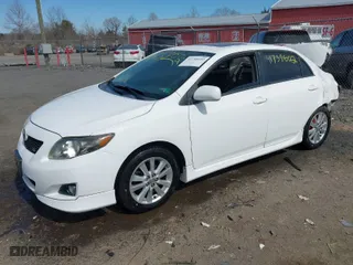 2010 Toyota Corolla with VIN 2T1BU4EE1AC535757, listed as a IAAI auction lot 41758602 with 154,882 mi miles. Bid and sale history available at carsss.com. Image 2.