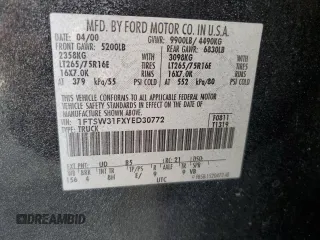 2000 Ford F-350 XL with VIN 1FTSW31FXYED30772, listed as a Copart auction lot 50606445 with 402,923 mi miles and Salvage title. Bid and sale history available at DreamBid. Image 13.